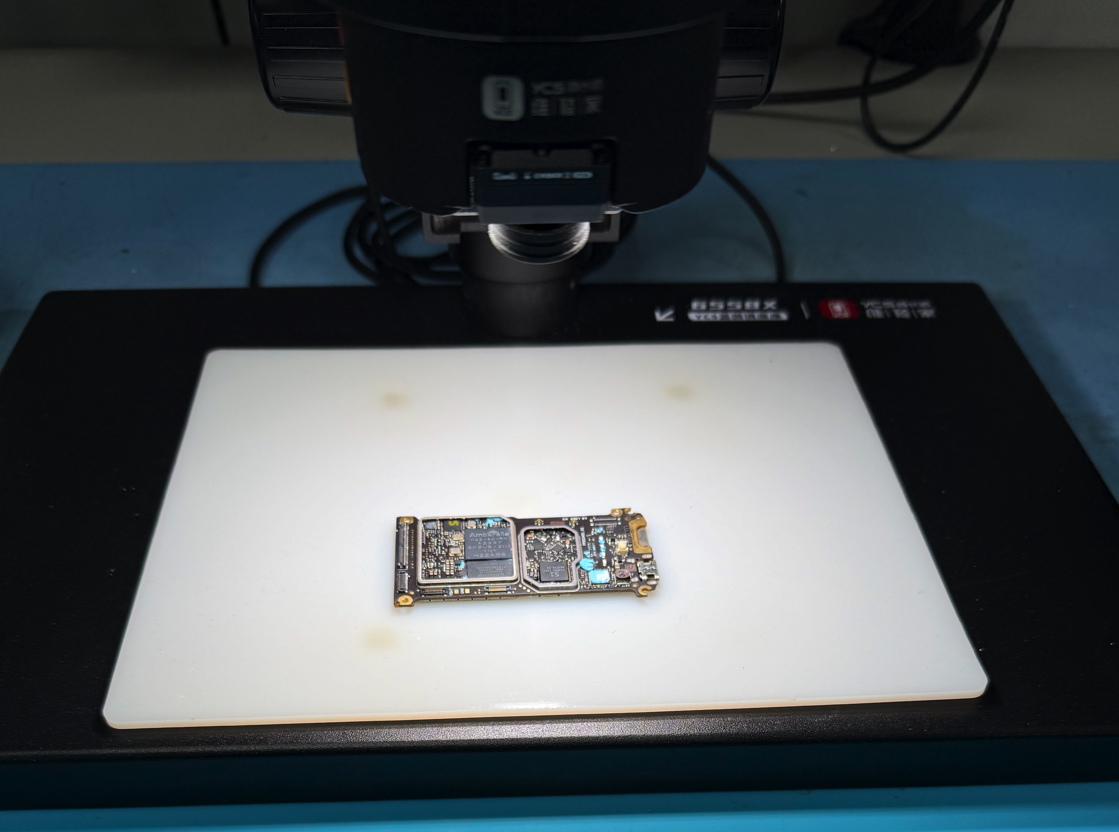 Microscope inspecting a PCB at Reboot training facility